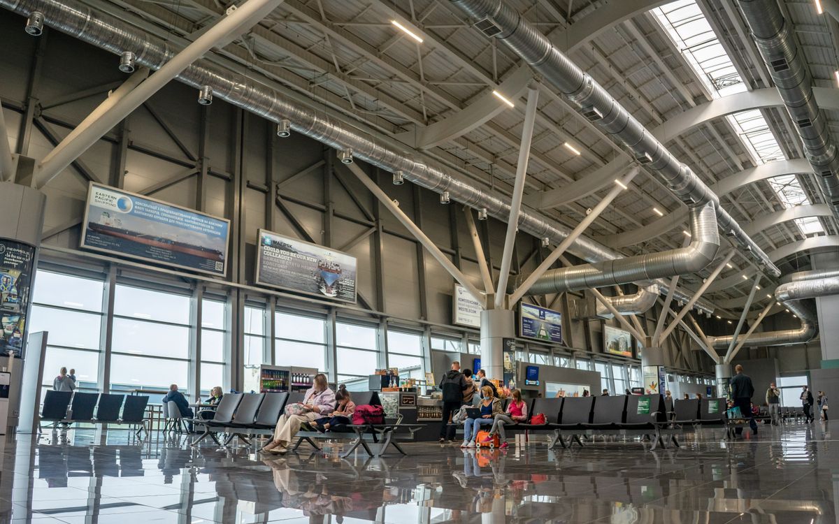 Heathrow Terminal 2 departure lounge — allow 60–90 minutes before your flight